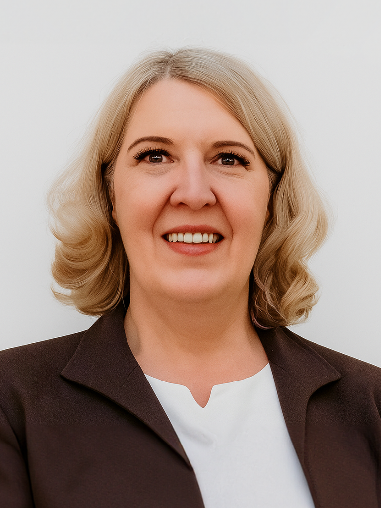 Ein Portraitfoto von Dr. Jacqueline Repmann, auf dem sie freundlich lächelt